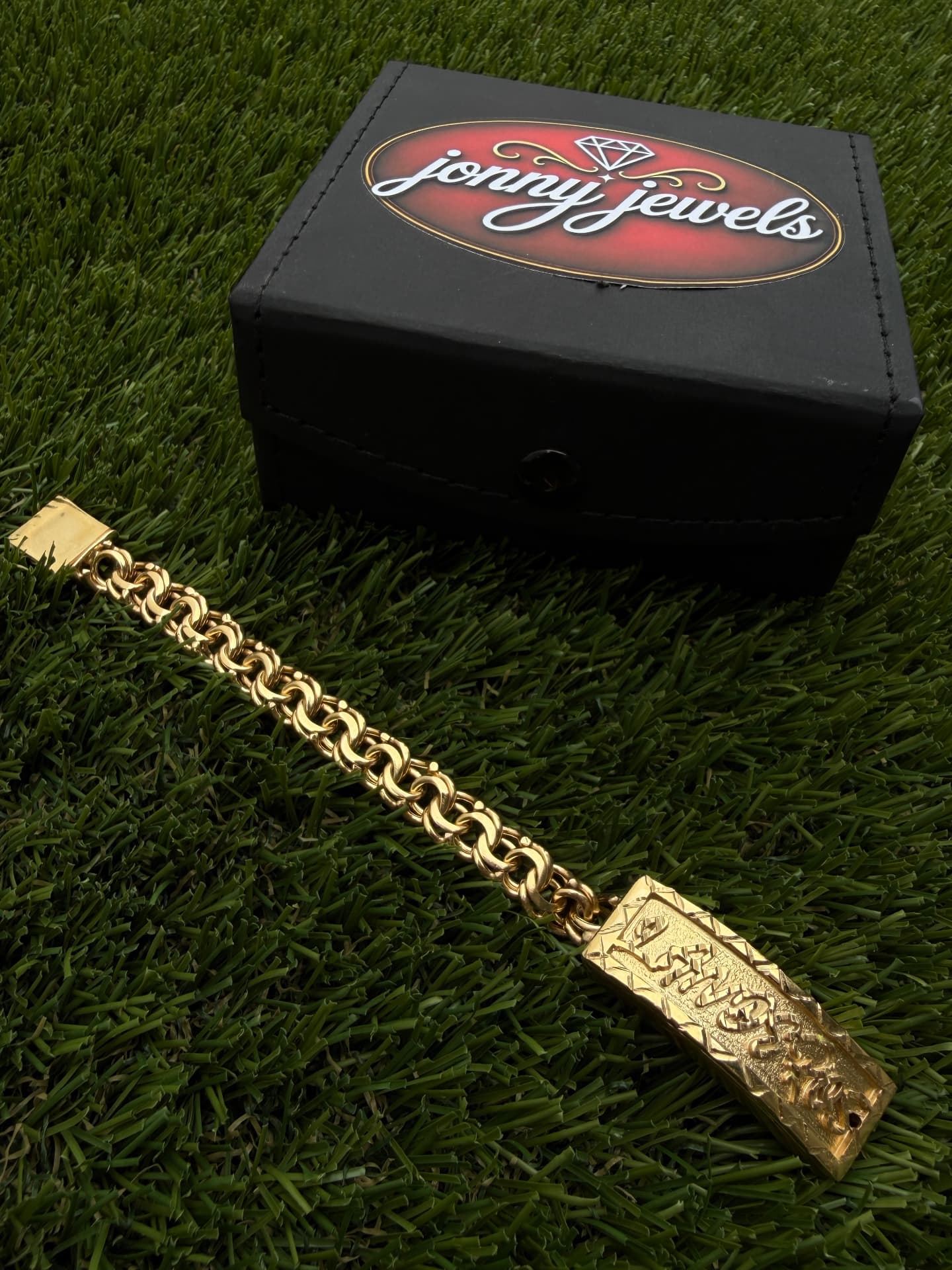 Jonny Jewels custom chino-link gold chain with engraved nameplate and branded box
