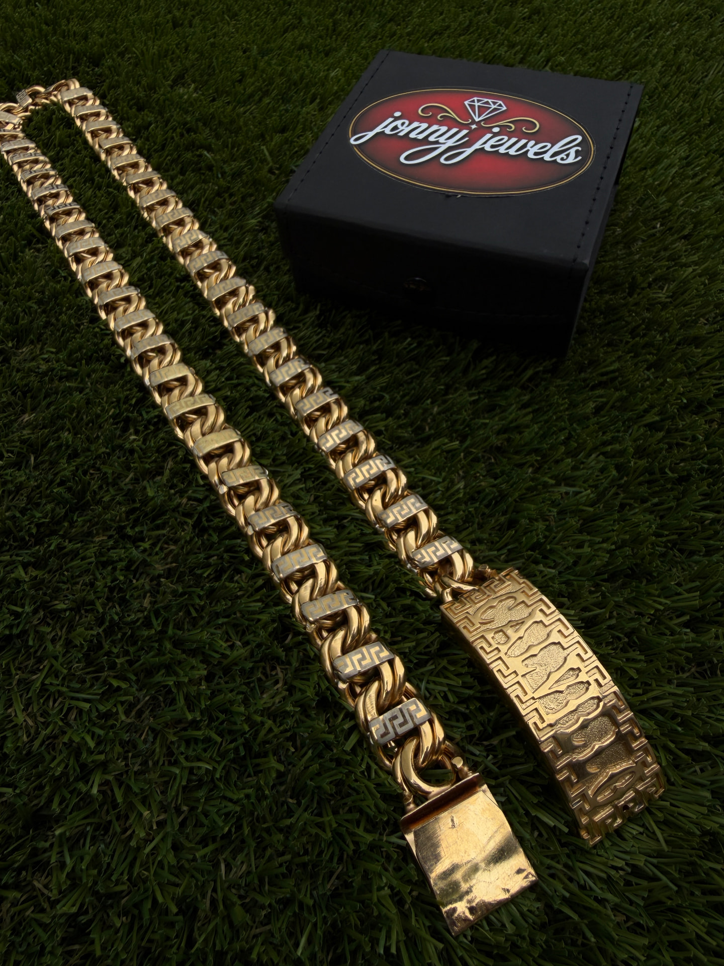 Jonny Jewels two-tone Greek-key gold chain with engraved nameplate and branded box